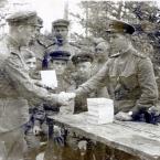 Репкин Иван Ефимович вручает бойцам боевые награды. 1943 год.
